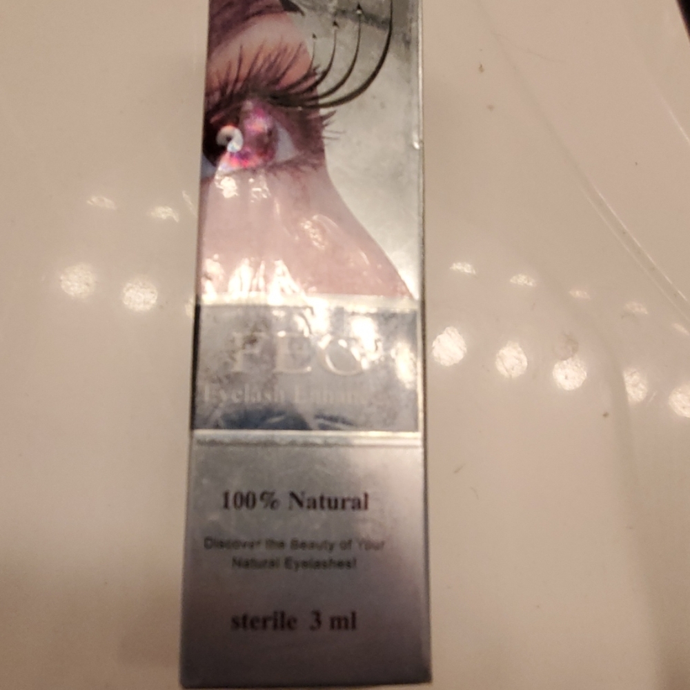 Eye lash enhancer